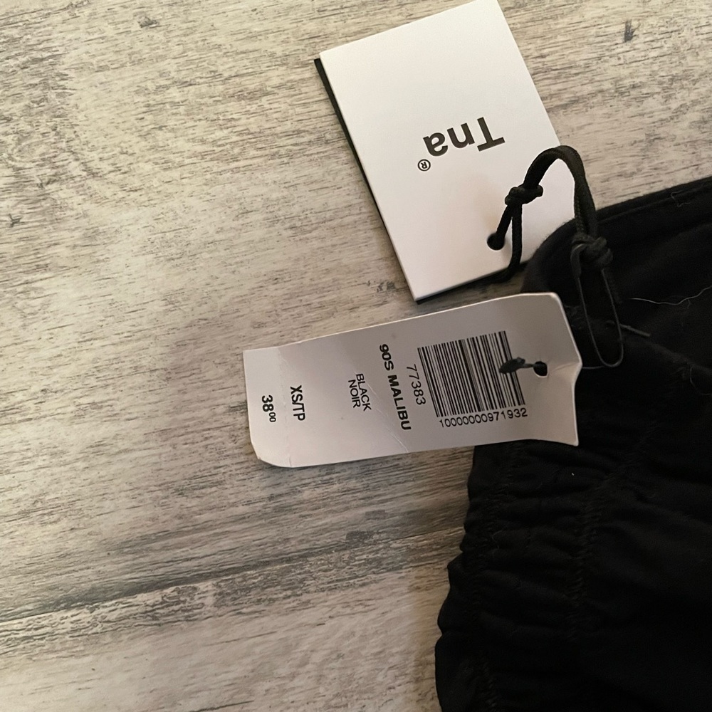 Aritzia brand TNA black ruched mini skirt - Picture 2 of 2